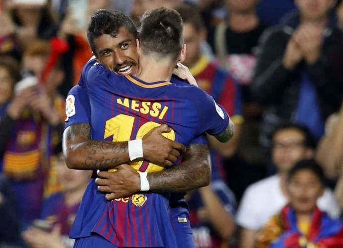 messi e paulinho 19